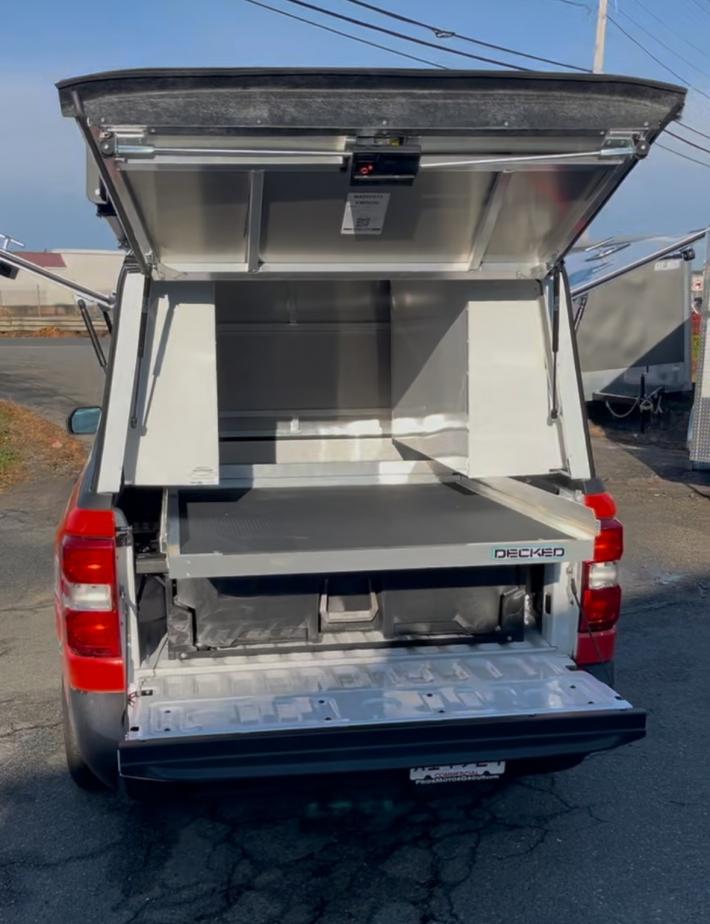 A.R.E. Truck Cap  with DECKED System and Cargo Glide